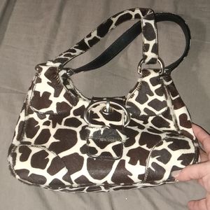 Small giraffe print Prada handbag